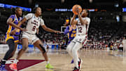 Mar 21, 2025; Columbia, South Carolina, USA; South Carolina Gamecocks guard MiLaysia Fulwiley (12) pulls up for a basket in front of forward Joyce Edwards (8) during the first half against the Tennessee Tech Golden Eagles at Colonial Life Arena. Mandatory Credit: Jim Dedmon-Imagn Images