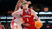 Mar 8, 2025; Lawrence, Kansas, USA; Kansas Jayhawks center Hunter Dickinson (1) drives to the basket during the second half against the Arizona Wildcats at Allen Fieldhouse. Mandatory Credit: William Purnell-Imagn Images