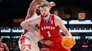 Mar 8, 2025; Lawrence, Kansas, USA; Kansas Jayhawks center Hunter Dickinson (1) drives to the basket during the second half against the Arizona Wildcats at Allen Fieldhouse. 
