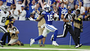 Oct 5, 2025; Indianapolis, Indiana, USA; Indianapolis Colts wide receiver Ashton Dulin (16) runs with the ball against the Las Vegas Raiders but the play was called back due to a penalty during the first quarter at Lucas Oil Stadium. 