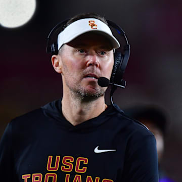 Nov 7, 2025; Los Angeles, California, USA; Southern California Trojans head coach Lincoln Riley watches game action against the Northwestern Wildcats during the second half at the Los Angeles Memorial Coliseum. Mandatory Credit: Gary A. Vasquez-Imagn Images