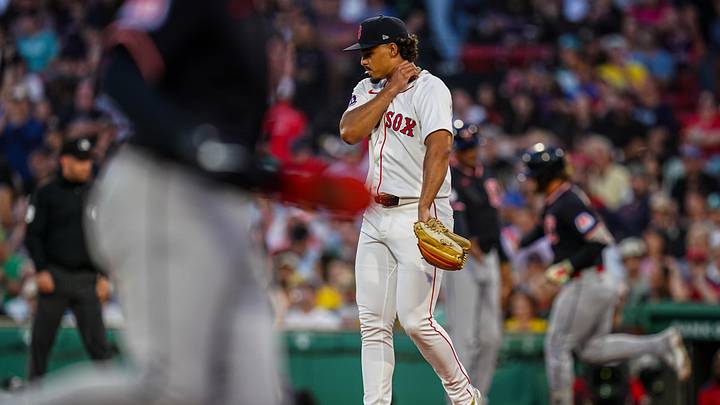 Sep 3, 2025; Boston, Massachusetts, USA; Cleveland Guardians shortstop Gabriel Arias (13) hits a two run home run against Boston Red Sox pitcher Jordan Hicks (46) in the second inning at Fenway Park. Mandatory Credit: David Butler II-Imagn Images