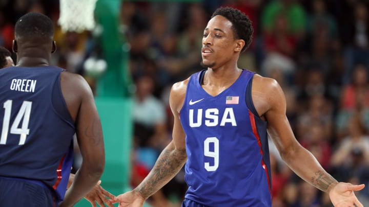 Aug 21, 2016; Rio de Janeiro, Brazil; USA guard Demar DeRozan (9) celebrates with USA forward Draymond Green (14) against Serbia in the men's basketball gold medal match during the Rio 2016 Summer Olympic Games at Carioca Arena 1. Mandatory Credit: David E. Klutho-USA TODAY Sports