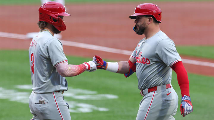 Jun 11, 2024; Boston, Massachusetts, USA; Philadelphia Phillies designated hitter Kyle Schwarber (12) celebrates with Philadelphia Phillies first baseman Bryce Harper (3) after a leadoff solo home run during the first inning against the Boston Red Sox at Fenway Park