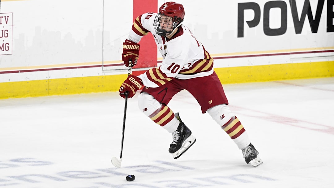 Feb 28, 2025; Chestnut Hill, MA, USA; Boston College forward James Hagens (10) skates with the puck during the second period against the University of New Hampshire Wildcats at Conte Forum.