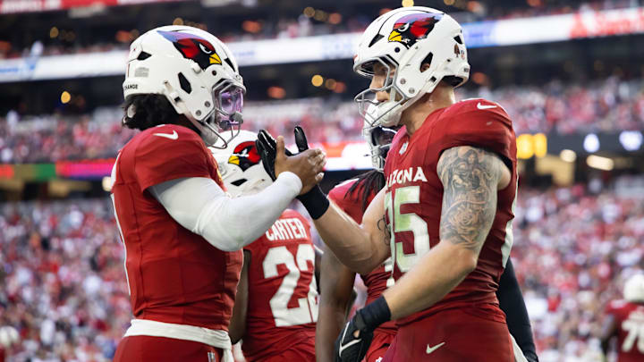 Jan 5, 2025; Glendale, Arizona, USA; Arizona Cardinals quarterback Kyler Murray (1) celebrates a touchdown with tight end Trey McBride (85) against the San Francisco 49ers at State Farm Stadium. Mandatory Credit: Mark J. Rebilas-Imagn Images Jan 5, 2025; Glendale, Arizona, USA; Arizona Cardinals quarterback Kyler Murray (1) celebrates a touchdown with tight end Trey McBride (85) against the San Francisco 49ers at State Farm Stadium. Mandatory Credit: Mark J. Rebilas-Imagn Images