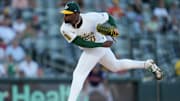 Jun 18, 2025; West Sacramento, California, USA; Athletics pitcher Luis Severino (40) follows through on a pitch against the Houston Astros in the first inning at Sutter Health Park. Mandatory Credit: Cary Edmondson-Imagn Images