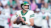 Nov 10, 2024; Glendale, Arizona, USA; New York Jets quarterback Aaron Rodgers (8) passes against the Arizona Cardinals during the second half at State Farm Stadium.