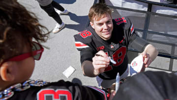 April 13, 2024; Columbus, Ohio, USA; 
Ohio State Buckeyes quarterback Will Howard (18) signs
