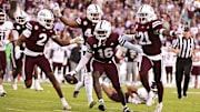 Mississippi State Bulldogs linebacker Zakari Tillman (16) reacts with teammates after an interception against the Texas A&M Aggies during the fourth quarter at Davis Wade Stadium at Scott Field.