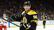 Apr 5, 2025; Boston, Massachusetts, USA; Boston Bruins center Morgan Geekie (39) reacts after scoring a goal during the first period against the Carolina Hurricanes at TD Garden. Mandatory Credit: Bob DeChiara-Imagn Images