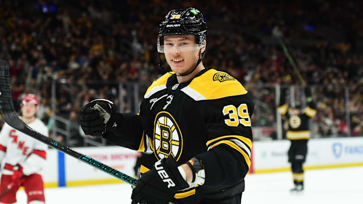 Apr 5, 2025; Boston, Massachusetts, USA; Boston Bruins center Morgan Geekie (39) reacts after scoring a goal during the first period against the Carolina Hurricanes at TD Garden. Mandatory Credit: Bob DeChiara-Imagn Images