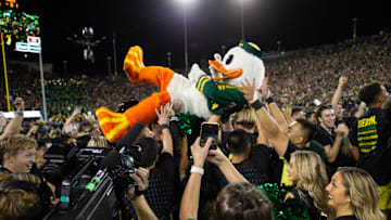 The Oregon Ducks surfs the crowd after the football team defeated Ohio State at Autzen Stadium Saturday, Oct. 12, 2024.