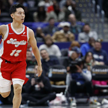 Dec 8, 2024; Washington, District of Columbia, USA; Memphis Grizzlies guard Yuki Kawamura (17) dribbles the ball against the Washington Wizards in the fourth quarter at Capital One Arena. Mandatory Credit: Geoff Burke-Imagn Images