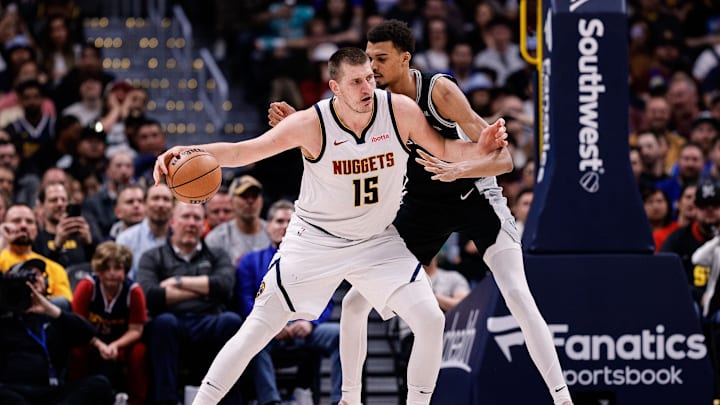 Apr 2, 2024; Denver, Colorado, USA; Denver Nuggets center Nikola Jokic (15) controls the ball as San