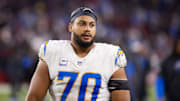 Oct 21, 2024; Glendale, Arizona, USA; Los Angeles Chargers offensive tackle Rashawn Slater (70) against the Arizona Cardinals at State Farm Stadium. Mandatory Credit: Mark J. Rebilas-Imagn Images