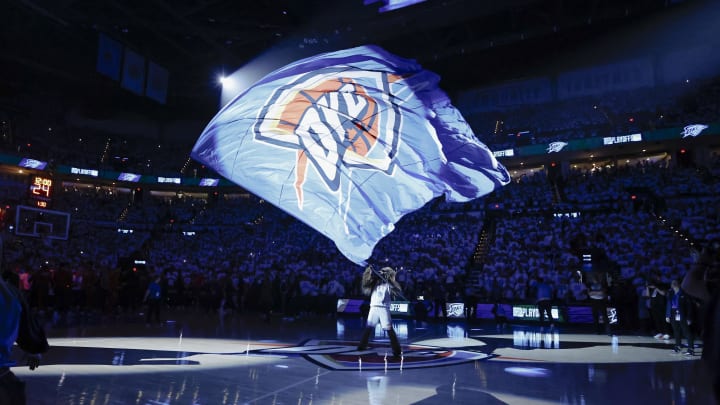 Apr 21, 2024; Oklahoma City, Oklahoma, USA; Oklahoma City Thunder mascot Rumble the Bison waves a giant flag before the start of game one of the first round for the 2024 NBA playoffs at Paycom Center. Mandatory Credit: Alonzo Adams-USA TODAY Sports