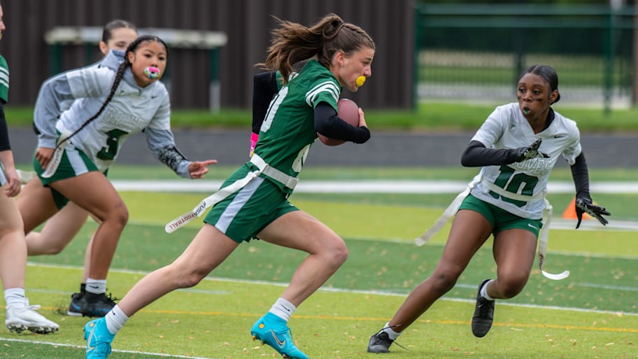 Auburn Hills Oakland Christian School's Eliza Keith runs after the catch during a Michigan Girls High School Flag Football