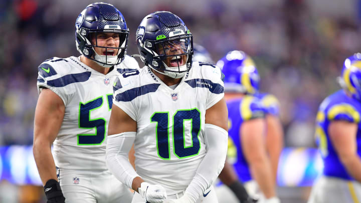 Dec 4, 2022; Inglewood, California, USA; Seattle Seahawks linebacker Uchenna Nwosu (10) and linebacker Cody Barton (57) react against the Los Angeles Rams during the second half at SoFi Stadium. Mandatory Credit: Gary A. Vasquez-USA TODAY Sports