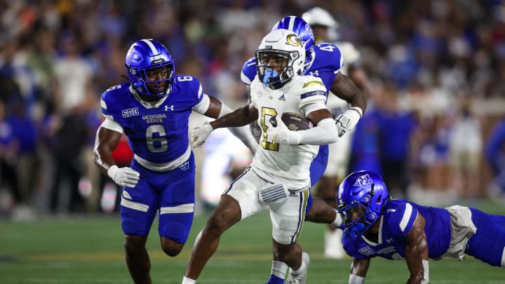 Aug 31, 2024; Atlanta, Georgia, USA; Georgia Tech Yellow Jackets wide receiver Malik Rutherford (8) runs after a catch against Georgia State Panthers in the third quarter at Bobby Dodd Stadium at Hyundai Field. Mandatory Credit: Brett Davis-USA TODAY Sports