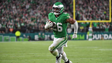 Nov 3, 2024; Philadelphia, Pennsylvania, USA; Philadelphia Eagles running back Saquon Barkley (26) score on a 19-yard touchdown run during the second quarter against the Jacksonville Jaguars at Lincoln Financial Field.