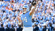 Oct 4, 2025; Chapel Hill, North Carolina, USA; North Carolina Tar Heels quarterback Max Johnson (14) looks to pass in the second quarter at Kenan Stadium. Mandatory Credit: Bob Donnan-Imagn Images
