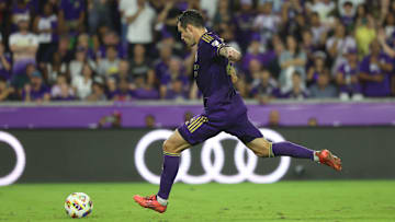Nov 9, 2024; Orlando, Florida, USA; Orlando City defender Kyle Smith (24) takes a penalty kick in a round of penalty kicks against the Charlotte FC in a 2024 MLS Cup Playoffs Round One match at Inter&Co Stadium. Mandatory Credit: Kim Klement Neitzel-Imagn Images