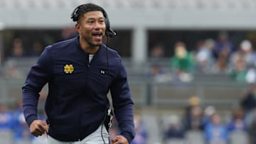 Nov 15, 2025; Pittsburgh, Pennsylvania, USA;  Notre Dame Fighting Irish head coach Marcus Freeman reacts after an Irish touchdown against the Pittsburgh Panthers during the second quarter at Acrisure Stadium. Mandatory Credit: Charles LeClaire-Imagn Images