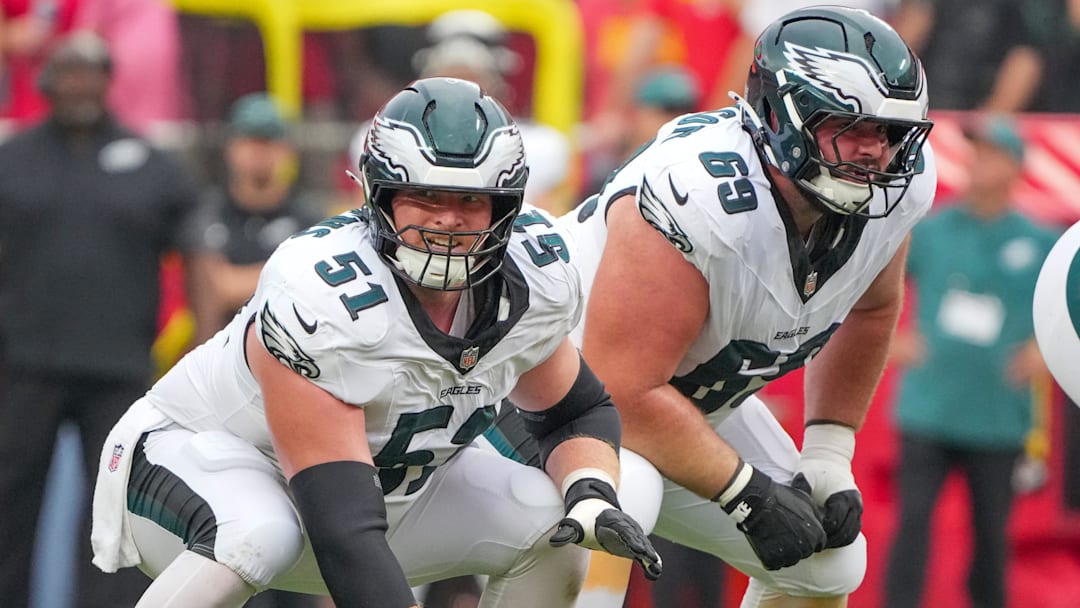 Sep 14, 2025; Kansas City, Missouri, USA; Philadelphia Eagles center Cam Jurgens (51) and guard Landon Dickerson (69) at the line of scrimmage against the Kansas City Chiefs during the second half of the game at GEHA Field at Arrowhead Stadium.