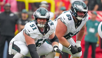 Sep 14, 2025; Kansas City, Missouri, USA; Philadelphia Eagles center Cam Jurgens (51) and guard Landon Dickerson (69) at the line of scrimmage against the Kansas City Chiefs during the second half of the game at GEHA Field at Arrowhead Stadium.