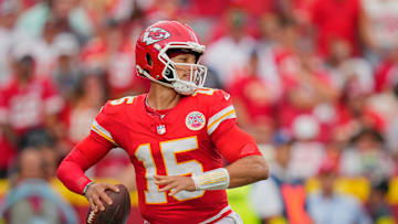 Kansas City Chiefs quarterback Patrick Mahomes (15) passes the ball against the Philadelphia Eagles during the fourth quarter of the game at GEHA Field at Arrowhead Stadium. 