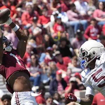 Apr 12, 2025; Tuscaloosa, AL, USA; Alabama wide receiver Isaiah Horton (1) catches a pass for a touchdown behind Alabama defensive back Dijon Lee Jr. (5) during A-Day at Bryant-Denny Stadium. Mandatory Credit: Gary Cosby/USA TODAY NETWORK via Imagn Images