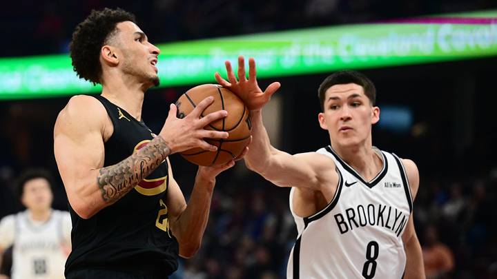 Feb 19, 2026; Cleveland, Ohio, USA; Cleveland Cavaliers guard Tyrese Proctor (24) drives to the basket against Brooklyn Nets guard Egor Demin (8) during the second half at Rocket Arena. Mandatory Credit: Ken Blaze-Imagn Images