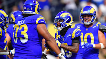 Oct 22, 2023; Inglewood, California, USA; Los Angeles Rams wide receiver Tutu Atwell (5) celebrates his touchdown scored against the Pittsburgh Steelers with guard Steve Avila (73) and wide receiver Cooper Kupp (10)  during the first half at SoFi Stadium. Mandatory Credit: Gary A. Vasquez-USA TODAY Sports