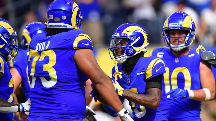 Oct 22, 2023; Inglewood, California, USA; Los Angeles Rams wide receiver Tutu Atwell (5) celebrates his touchdown scored against the Pittsburgh Steelers with guard Steve Avila (73) and wide receiver Cooper Kupp (10)  during the first half at SoFi Stadium. Mandatory Credit: Gary A. Vasquez-USA TODAY Sports