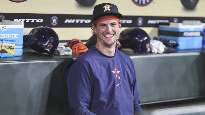 Apr 16, 2024; Houston, Texas, USA; Houston Astros pitcher Forrest Whitley (60) smiles in the dugout before the game against the Atlanta Braves at Minute Maid Park. 