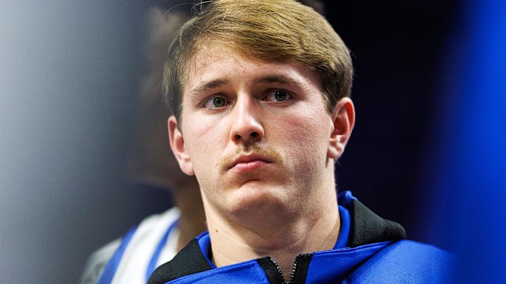Nov 9, 2024; Lexington, Kentucky, USA; Kentucky Wildcats guard Travis Perry listens in the huddle during a timeout in the second half against the Bucknell Bison at Rupp Arena at Central Bank Center. Mandatory Credit: Jordan Prather-Imagn Images