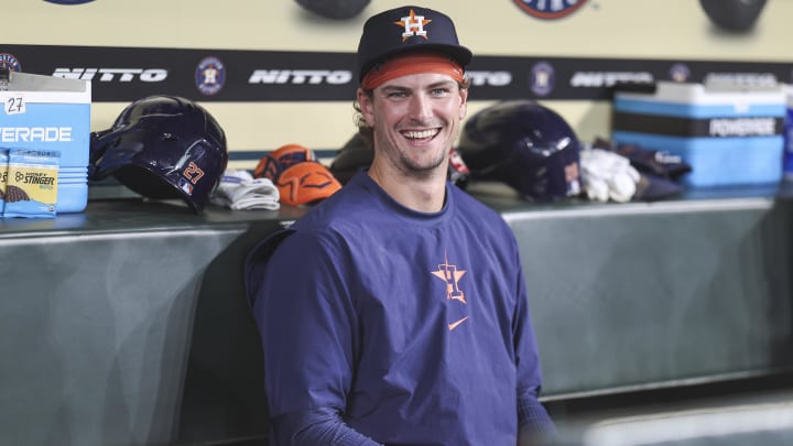 Apr 16, 2024; Houston, Texas, USA; Houston Astros pitcher Forrest Whitley (60) smiles in the dugout before the game against the Atlanta Braves at Minute Maid Park