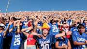 Kansas Jayhawks fans react to a touchdown during the game between Fresno State and Kansas at David Booth Kansas Memorial Stadium on Aug. 23, 2025.