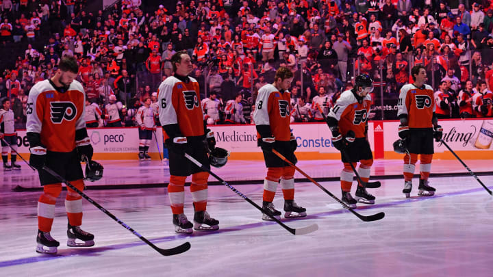 Apr 16, 2024; Philadelphia, Pennsylvania, USA; Philadelphia Flyers center Ryan Poehling (25), defenseman Travis Sanheim (6), defenseman Cam York (8), right wing Travis Konecny (11) and right wing Tyson Foerster (71) during national anthem against the Washington Capitals at Wells Fargo Center. Mandatory Credit: Eric Hartline-USA TODAY Sports