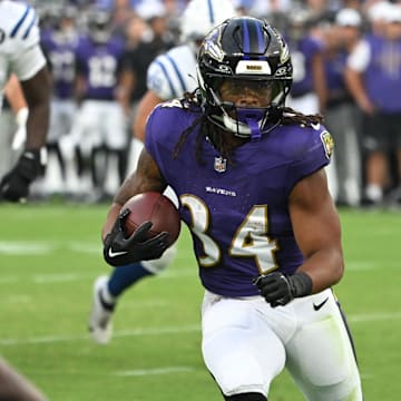 Aug 7, 2025; Baltimore, Maryland, USA; Baltimore Ravens running back Keaton Mitchell (34) runs to the end zone for a touchdown  against the Indianapolis Colts during the first quarter at M&T Bank Stadium. Mandatory Credit: Rafael Suanes-Imagn Images