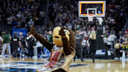 Mar 23, 2025; Seattle, WA, USA; The Maryland mascot celebrates on the court after the game between the Colorado State Rams and the Maryland Terrapins at Climate Pledge Arena. Mandatory Credit: Stephen Brashear-Imagn Images