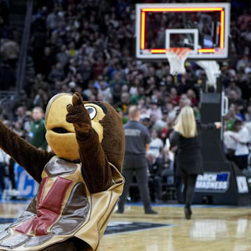 Mar 23, 2025; Seattle, WA, USA; The Maryland mascot celebrates on the court after the game between the Colorado State Rams and the Maryland Terrapins at Climate Pledge Arena. Mandatory Credit: Stephen Brashear-Imagn Images