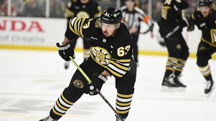 May 17, 2024; Boston, Massachusetts, USA; Boston Bruins left wing Brad Marchand (63) controls the puck during the third period in game six of the second round of the 2024 Stanley Cup Playoffs against the Florida Panthers at TD Garden. Mandatory Credit: Bob DeChiara-USA TODAY Sports