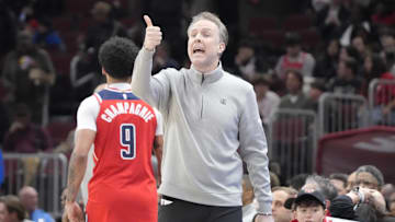 Apr 11, 2025; Chicago, Illinois, USA; Washington Wizards head coach Brian Keefe gestures to his team against the Chicago Bulls during the first quarter at United Center. Mandatory Credit: David Banks-Imagn Images