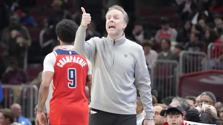 Apr 11, 2025; Chicago, Illinois, USA; Washington Wizards head coach Brian Keefe gestures to his team against the Chicago Bulls during the first quarter at United Center. Mandatory Credit: David Banks-Imagn Images