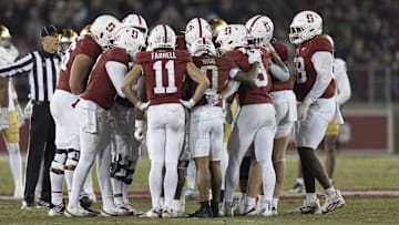 Nov 29, 2025; Stanford, California, USA;  Stanford Cardinal in a huddle during the third quarter against the Notre Dame Fighting Irish at Stanford Stadium. Mandatory Credit: Stan Szeto-Imagn Images