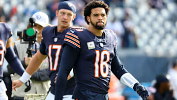 Nov 10, 2024; Chicago, Illinois, USA; Chicago Bears quarterback Caleb Williams (18) practices before the game against the New England Patriots at Soldier Field. Mandatory Credit: Mike Dinovo-Imagn Images