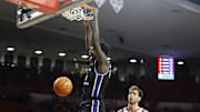 Dec 22, 2024; Norman, Oklahoma, USA; Central Arkansas Bears forward Nehemiah Turner (4) dunks against the Oklahoma Sooners during the first half at Lloyd Noble Center. Mandatory Credit: Alonzo Adams-Imagn Images
