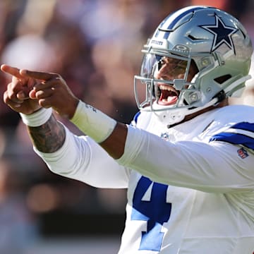 Dallas Cowboys quarterback Dak Prescott celebrates after a touchdown during the first half against the Cleveland Browns at Huntington Bank Field.